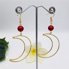 Crescent Moon Earrings Sustained With A Pearl In Different Colors