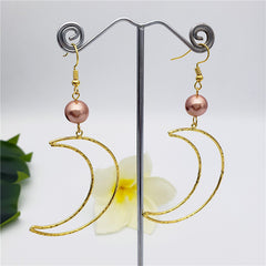 Crescent Moon Earrings Sustained With A Pearl In Different Colors