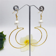 Crescent Moon Earrings Sustained With A Pearl In Different Colors