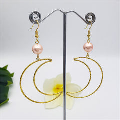 Crescent Moon Earrings Sustained With A Pearl In Different Colors