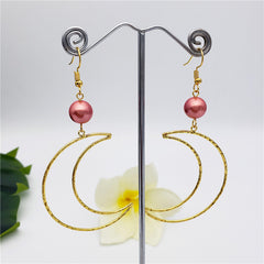 Crescent Moon Earrings Sustained With A Pearl In Different Colors