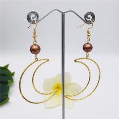 Crescent Moon Earrings Sustained With A Pearl In Different Colors