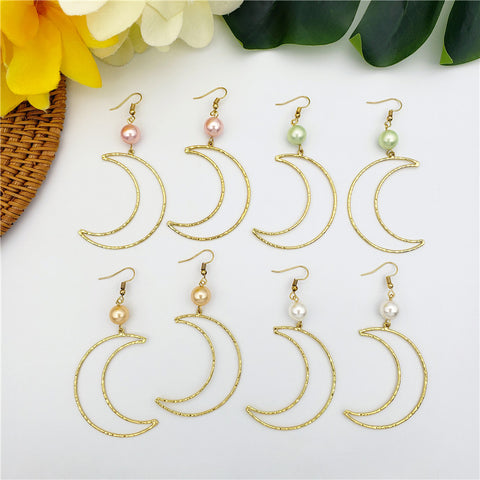 Crescent Moon Earrings Sustained With A Pearl In Different Colors