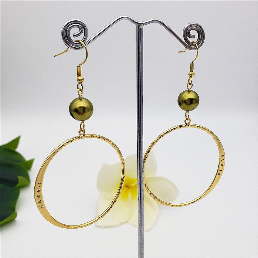 Hawaiian Circular Earrings Sustained With A Pearl In Different Colors