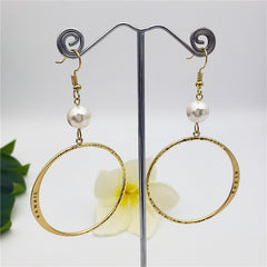 Hawaiian Circular Earrings Sustained With A Pearl In Different Colors