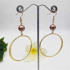 Hawaiian Circular Earrings Sustained With A Pearl In Different Colors