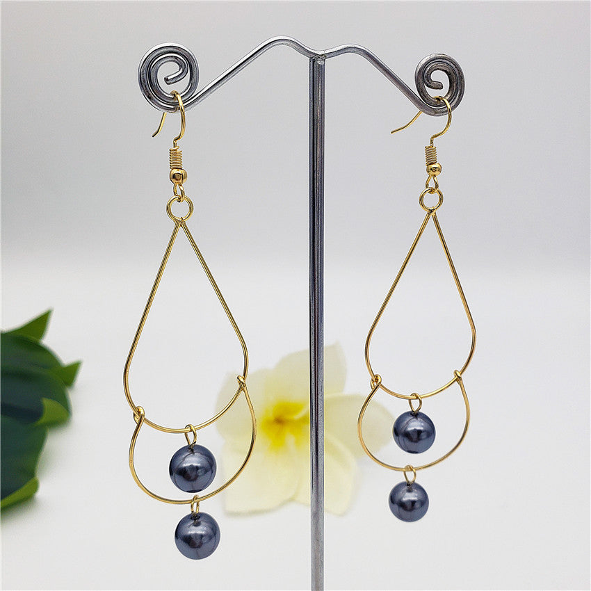 Double Teardrop Long Earrings Sustained With Pearls In Different Colors