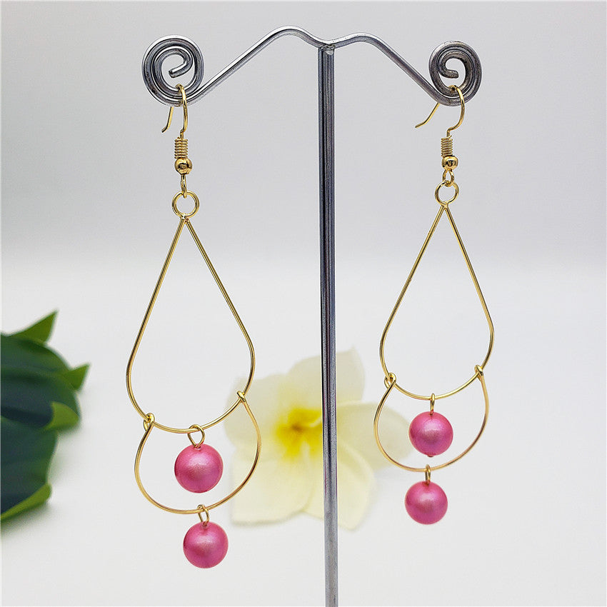 Double Teardrop Long Earrings Sustained With Pearls In Different Colors