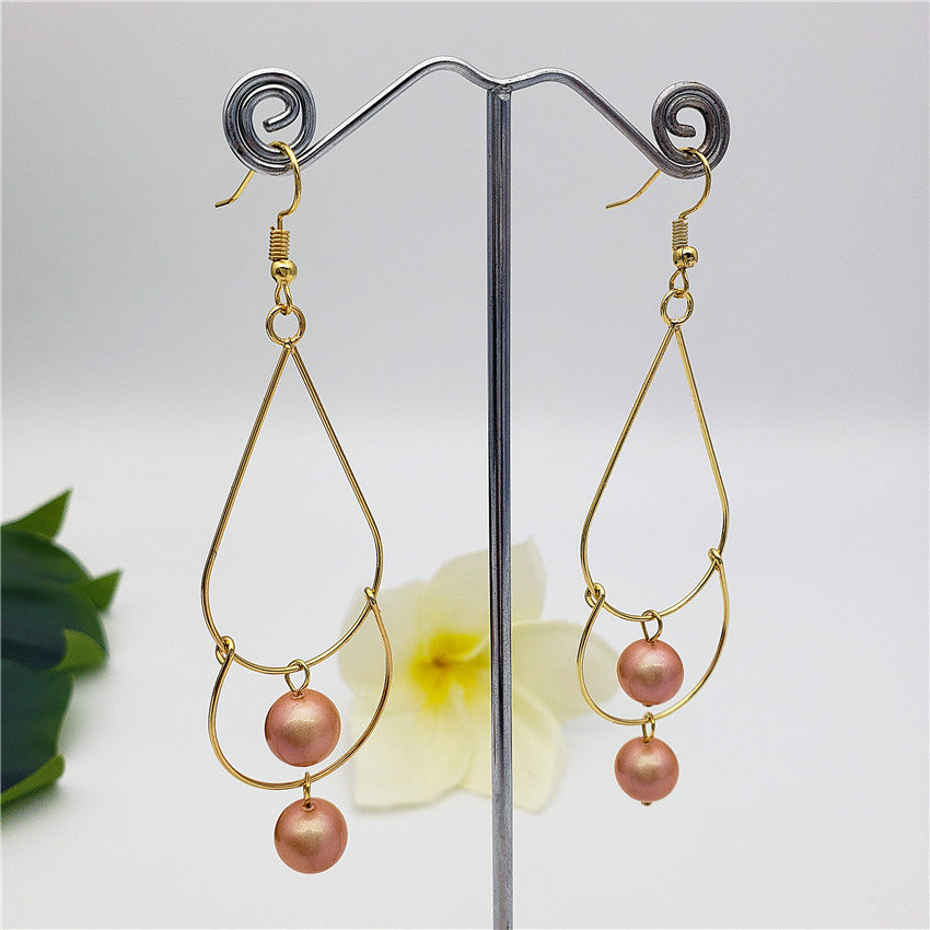 Double Teardrop Long Earrings Sustained With Pearls In Different Colors