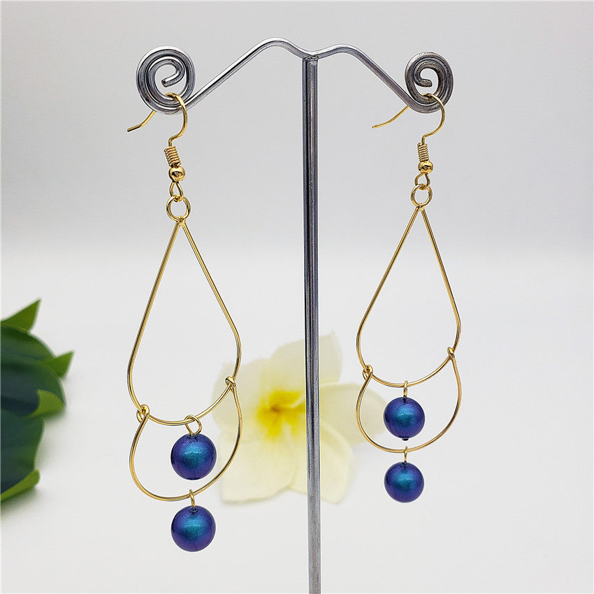 Double Teardrop Long Earrings Sustained With Pearls In Different Colors