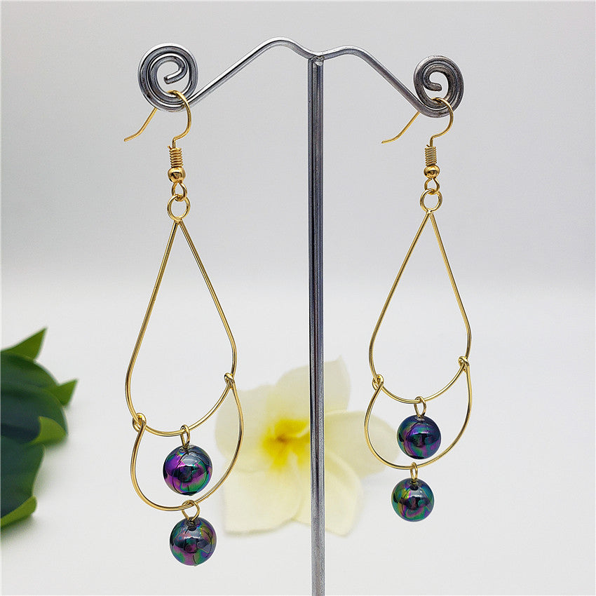 Double Teardrop Long Earrings Sustained With Pearls In Different Colors