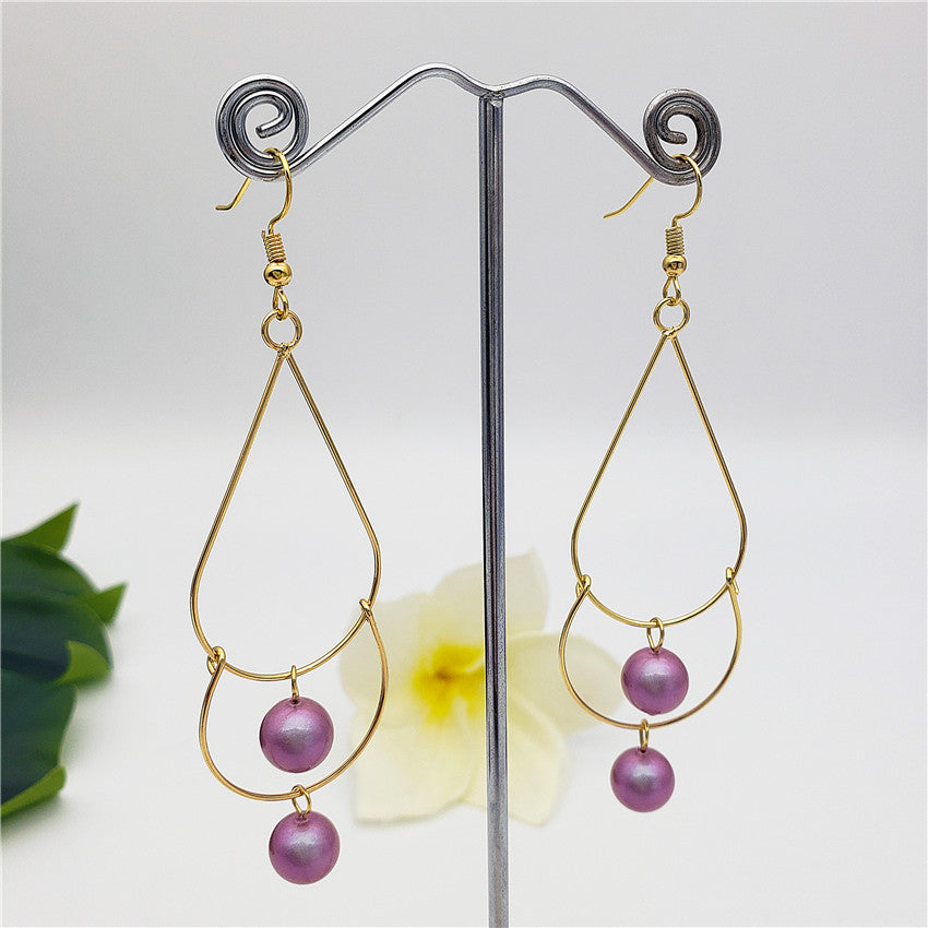 Double Teardrop Long Earrings Sustained With Pearls In Different Colors