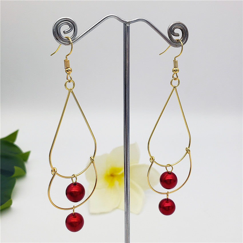 Double Teardrop Long Earrings Sustained With Pearls In Different Colors