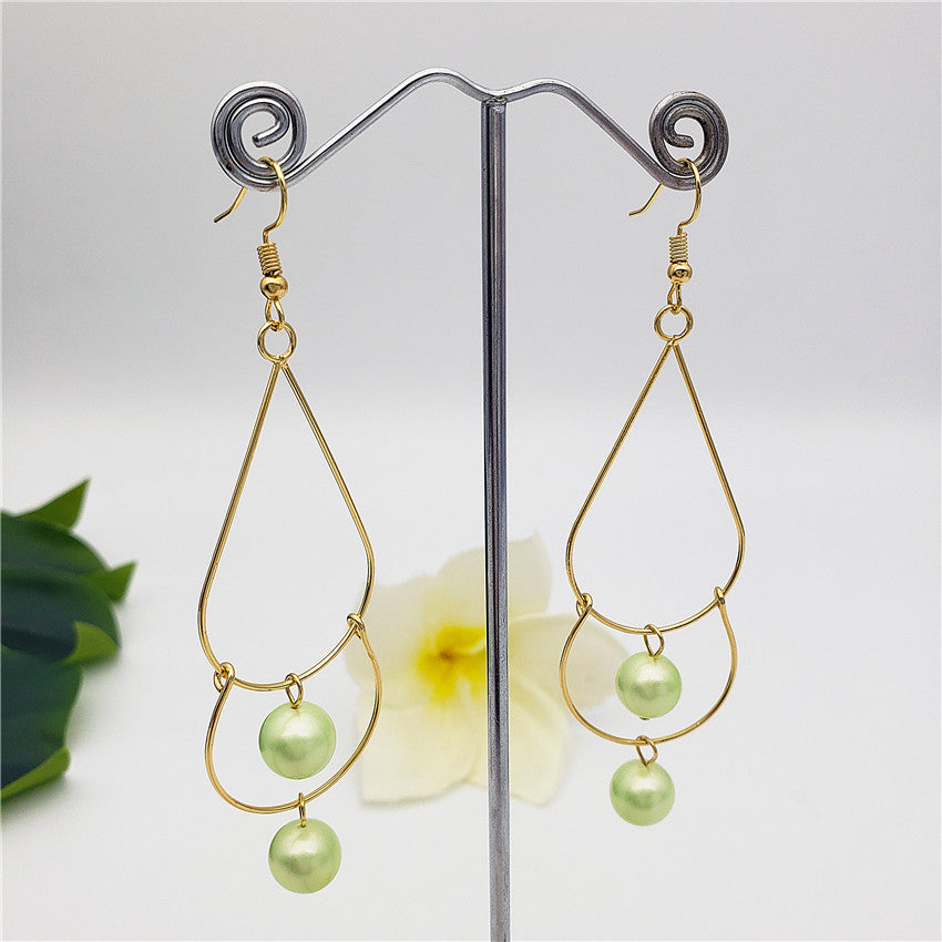 Double Teardrop Long Earrings Sustained With Pearls In Different Colors