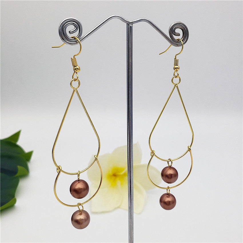 Double Teardrop Long Earrings Sustained With Pearls In Different Colors