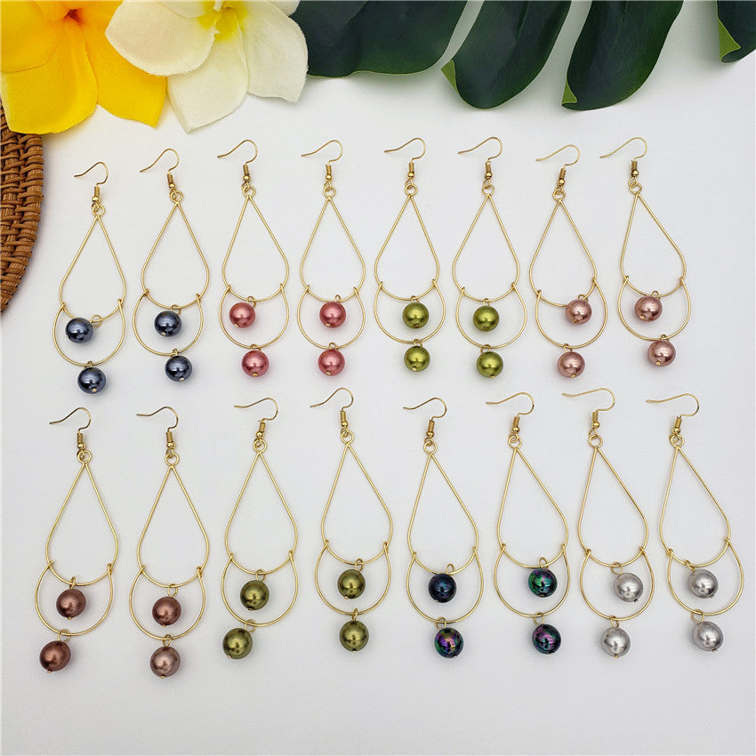 Double Teardrop Long Earrings Sustained With Pearls In Different Colors