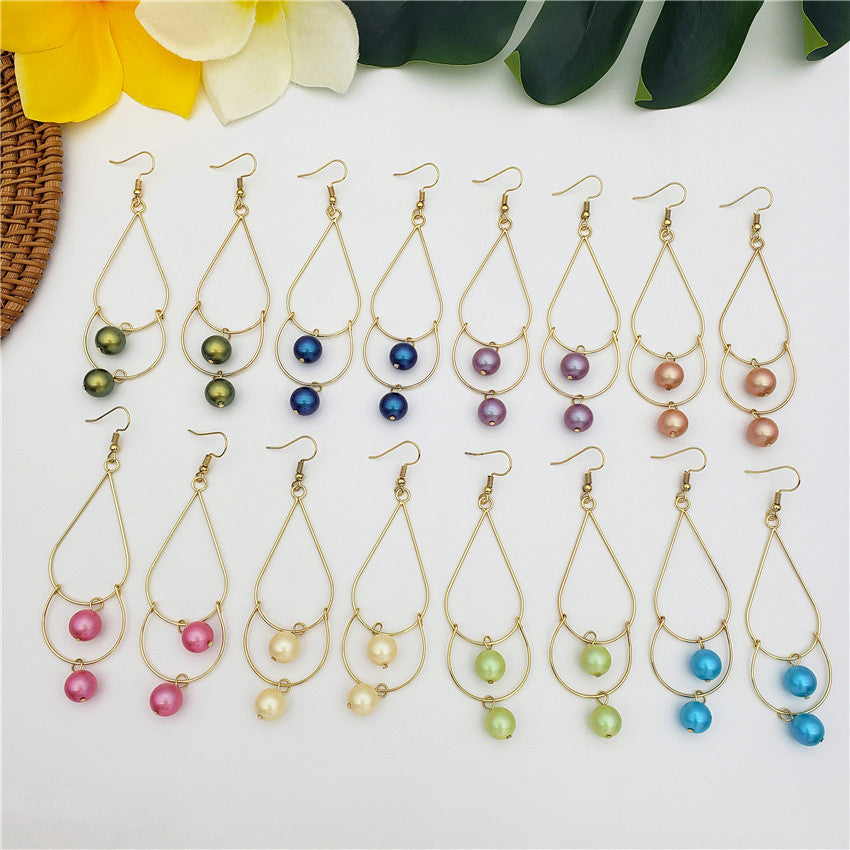 Double Teardrop Long Earrings Sustained With Pearls In Different Colors