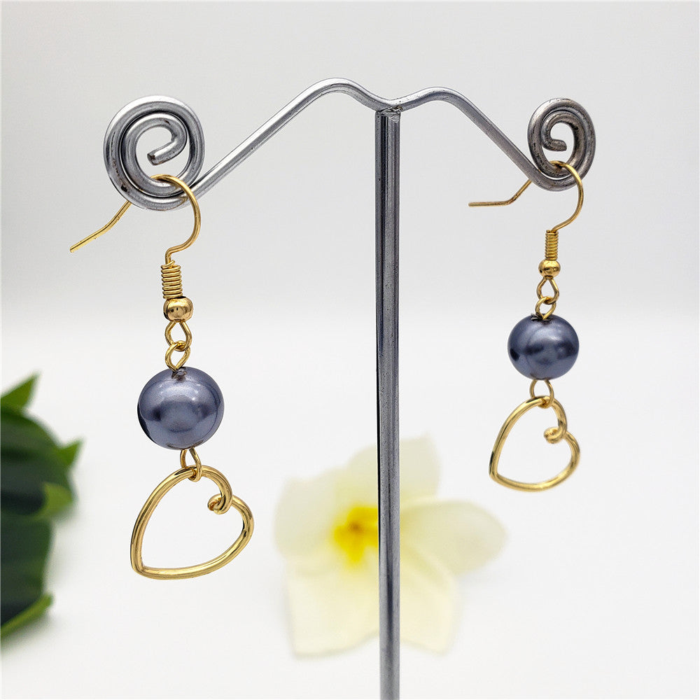 Petrol Pearl Hook Earrings Sustained With A Charm In Different Styles