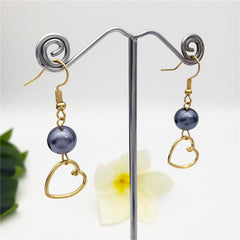 Petrol Pearl Hook Earrings Sustained With A Charm In Different Styles