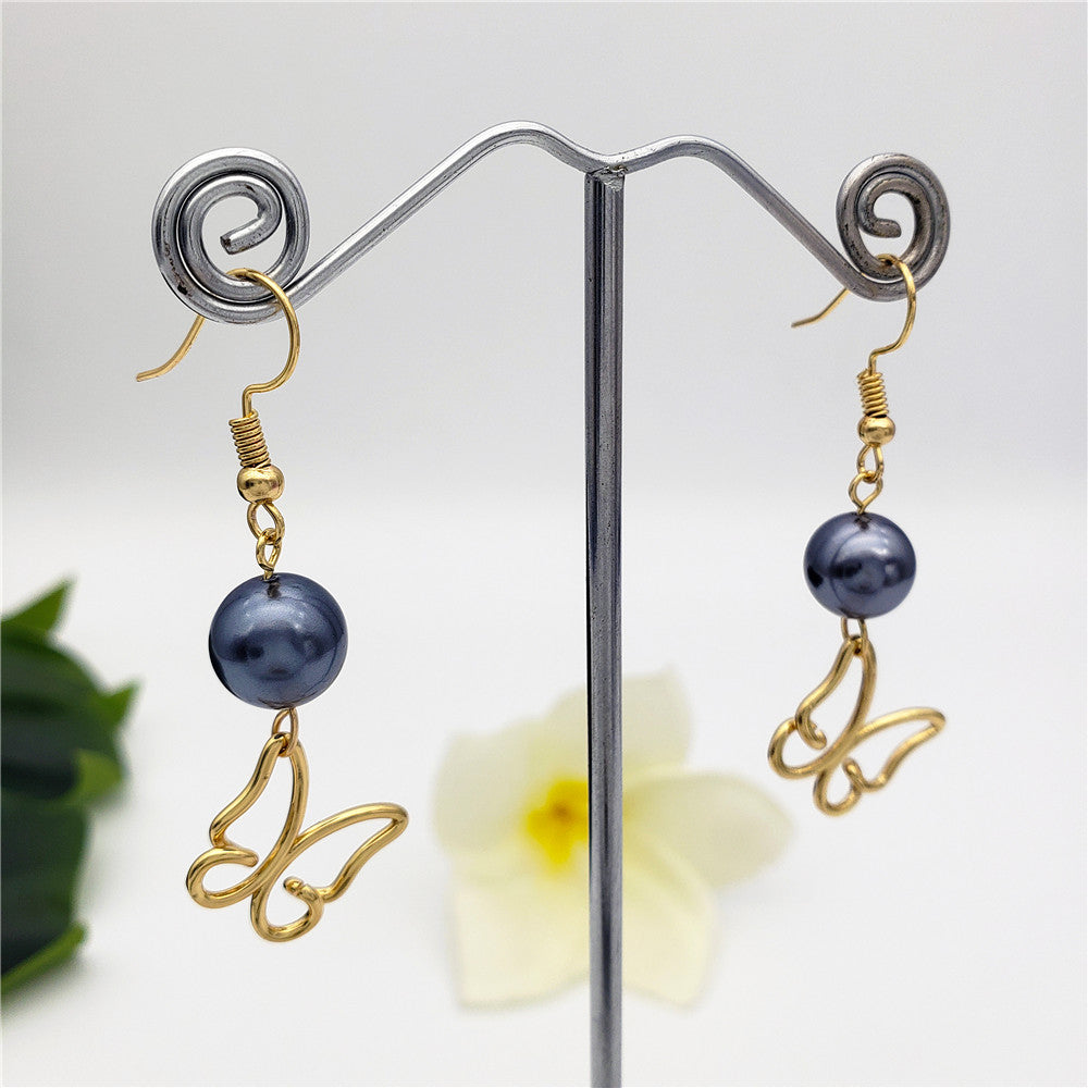 Petrol Pearl Hook Earrings Sustained With A Charm In Different Styles