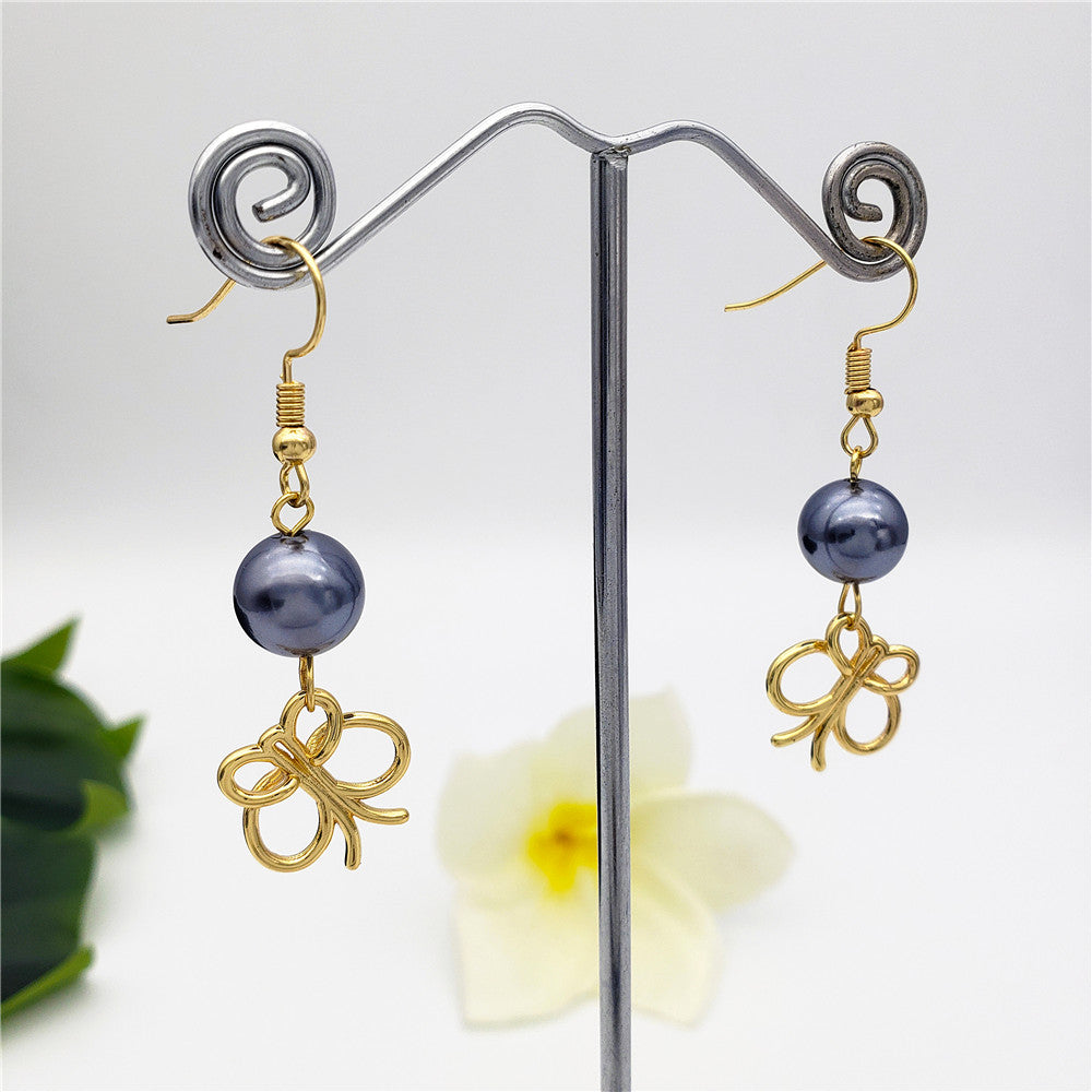 Petrol Pearl Hook Earrings Sustained With A Charm In Different Styles