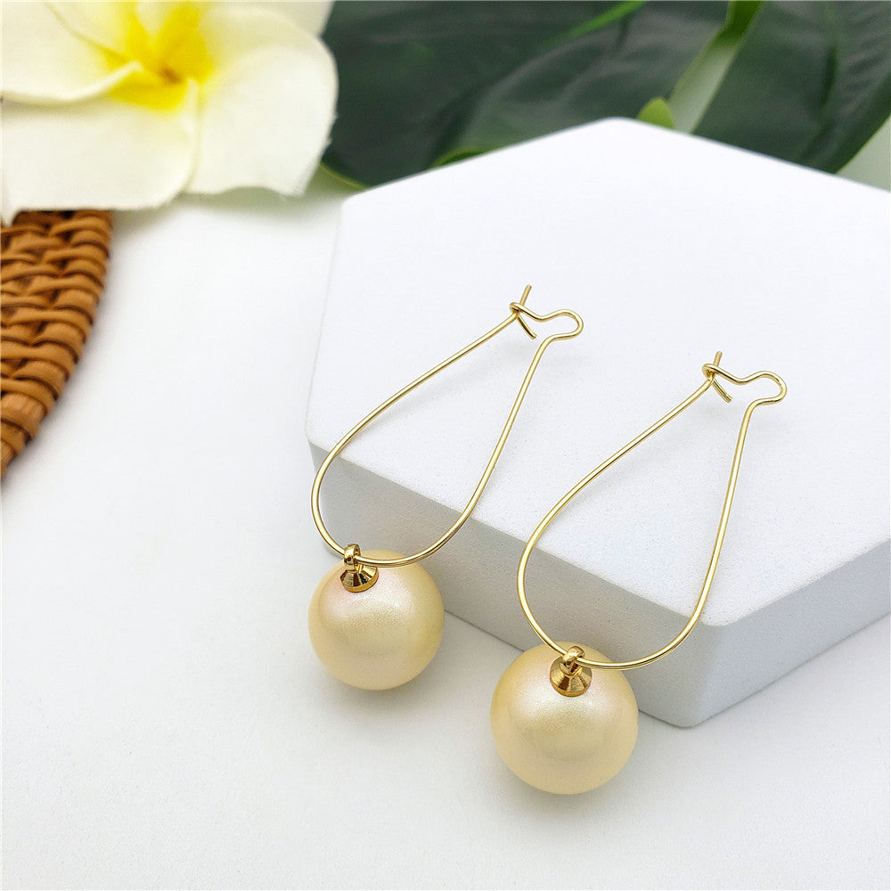 Egg Hoop Earrings With A Pearl In Different Colors