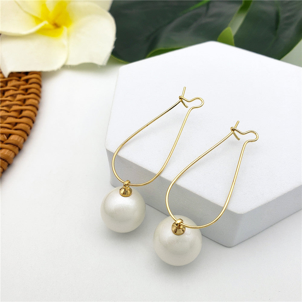 Egg Hoop Earrings With A Pearl In Different Colors