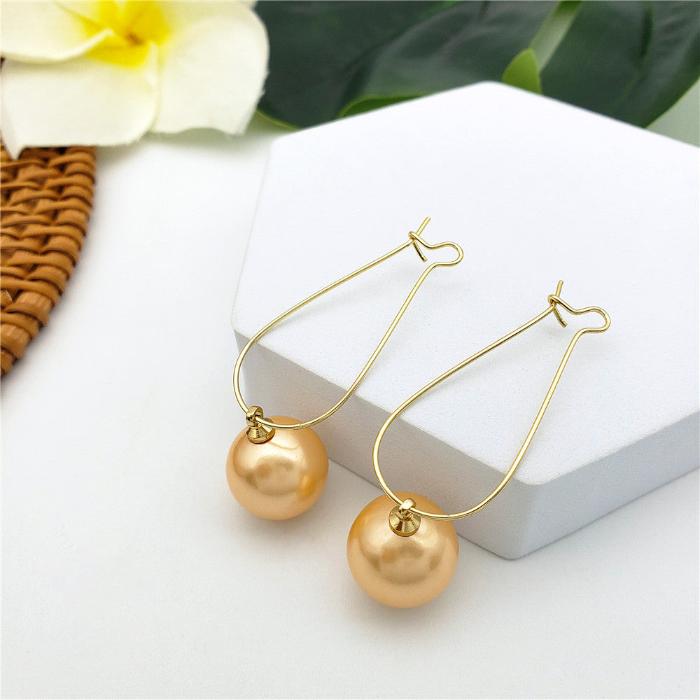 Egg Hoop Earrings With A Pearl In Different Colors