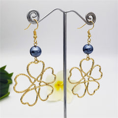 Hawaiian Heart Shaped Flower Petals Earrings Sustained With A Petrol Pearl