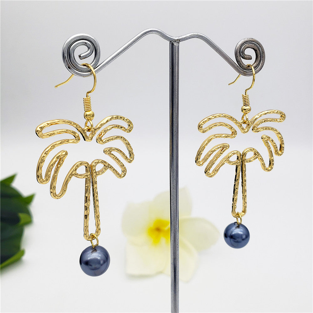 Hawaiian Palm Tree Earrings Sustained With A Petrol Pearl