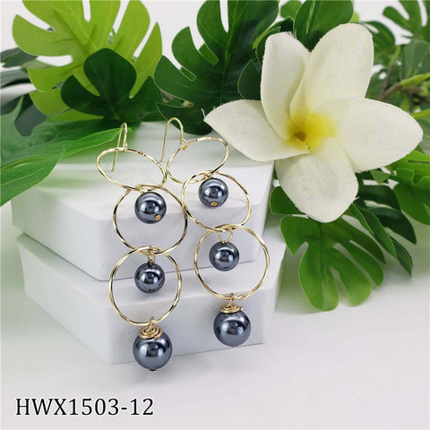 Triple Circle Drop Earrings Sustained With Petrol Pearls