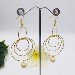 Circles Drop Earrings Sustained With A Pearl In Different Colors