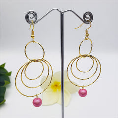 Circles Drop Earrings Sustained With A Pearl In Different Colors