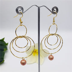 Circles Drop Earrings Sustained With A Pearl In Different Colors