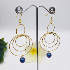 Circles Drop Earrings Sustained With A Pearl In Different Colors