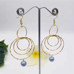 Circles Drop Earrings Sustained With A Pearl In Different Colors