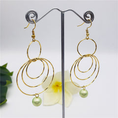 Circles Drop Earrings Sustained With A Pearl In Different Colors