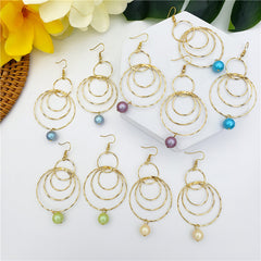 Circles Drop Earrings Sustained With A Pearl In Different Colors