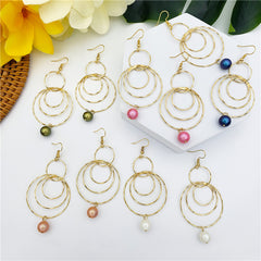 Circles Drop Earrings Sustained With A Pearl In Different Colors