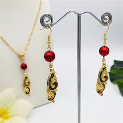 Set Of Carved Hawaiian Whale Earrings And Necklace Sustained With A Pearl In 2 Different Colors