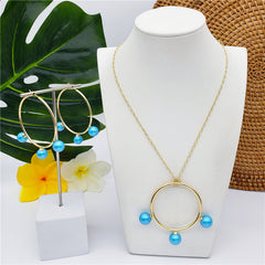 Set Of Round Earrings And Necklace With Triple Pearls On Each Circle In Different Colors And Styles