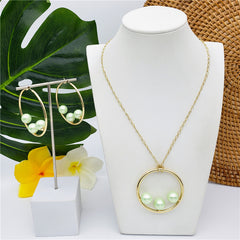 Set Of Round Earrings And Necklace With Triple Pearls On Each Circle In Different Colors And Styles