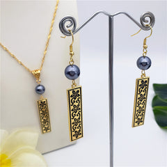 Set Of Carved Flowers & Winds Bar Drop Earrings And Necklace In Silver/Gold Sustained With A Petrol Pearl