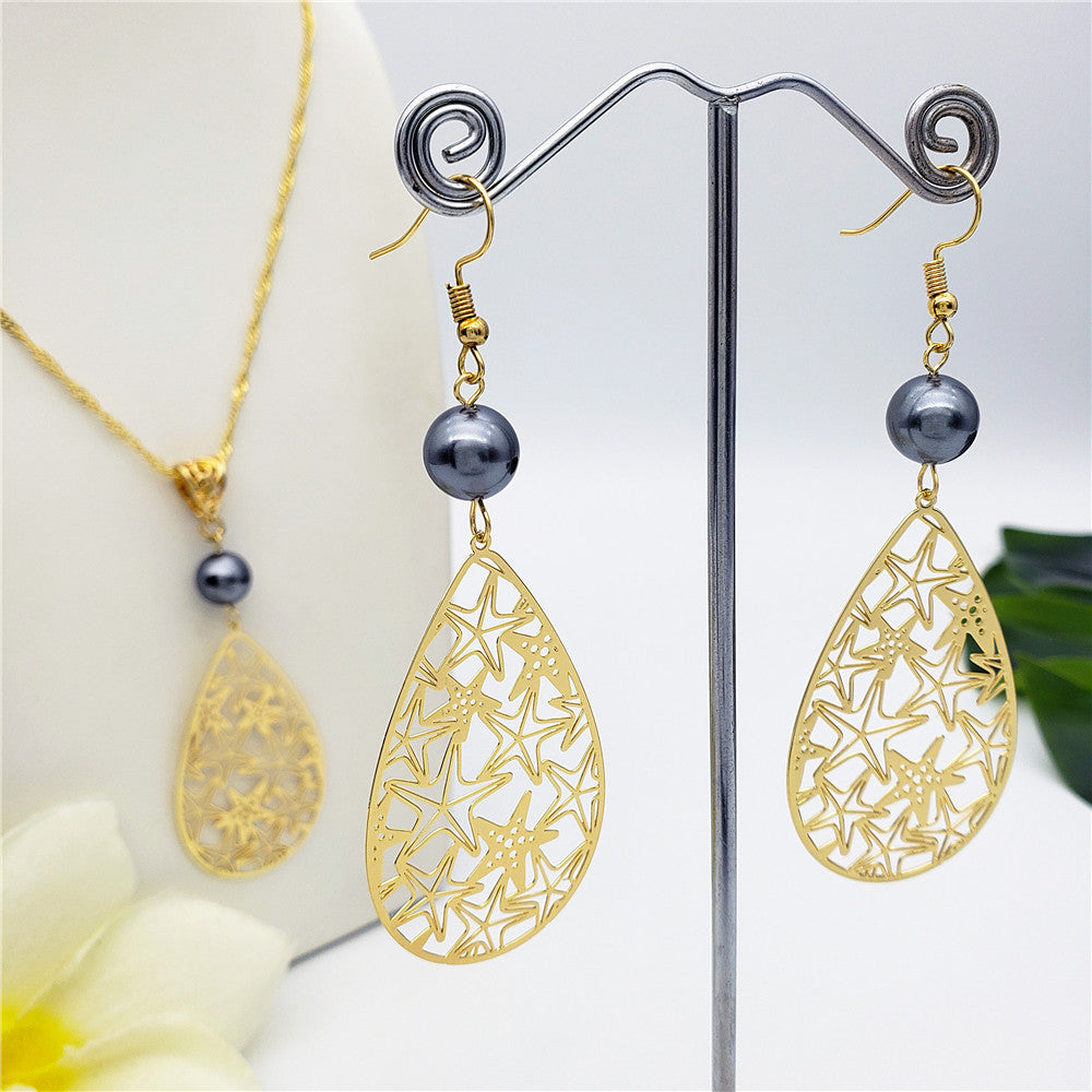 Set Of Carved Starfish Teardrop Earrings And Necklace Sustained With A Pearl In Different Colors