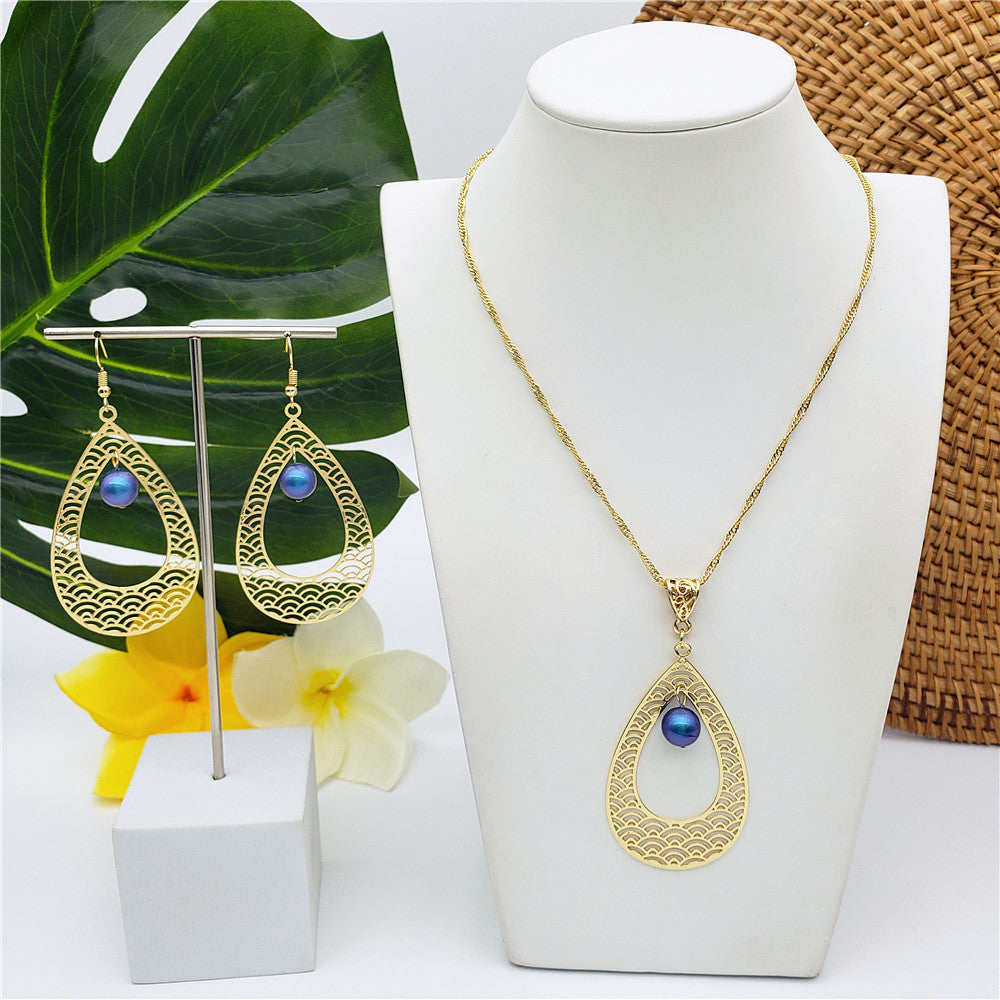 Set Of Carved Waves Double Teardrop Earrings And Necklace Sustained With A Pearl In Different Colors