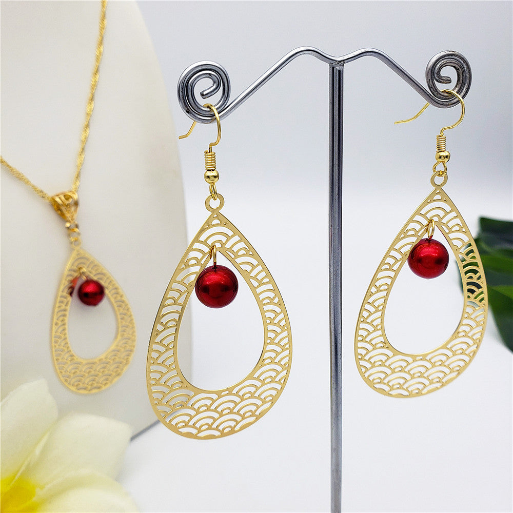 Set Of Carved Waves Double Teardrop Earrings And Necklace Sustained With A Pearl In Different Colors