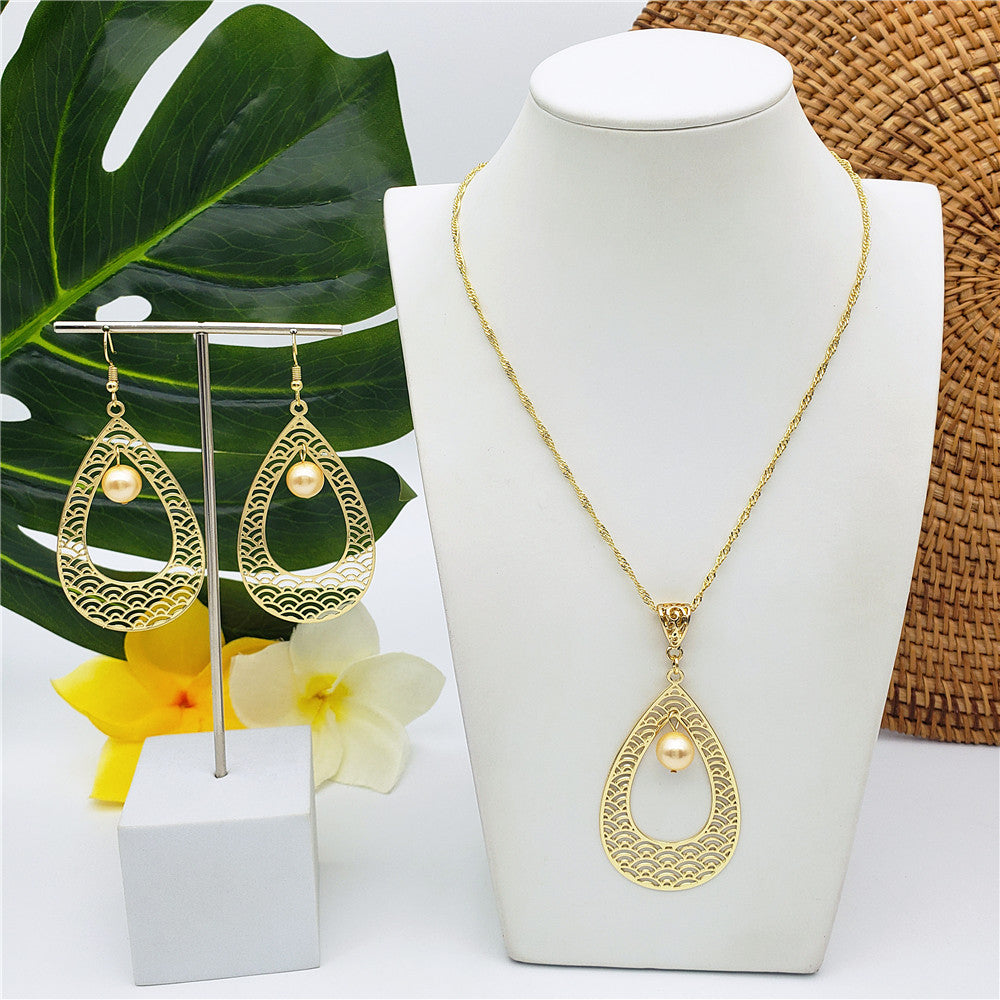 Set Of Carved Waves Double Teardrop Earrings And Necklace Sustained With A Pearl In Different Colors