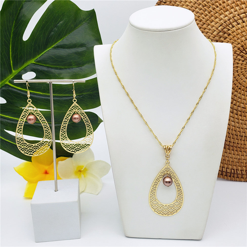 Set Of Carved Waves Double Teardrop Earrings And Necklace Sustained With A Pearl In Different Colors