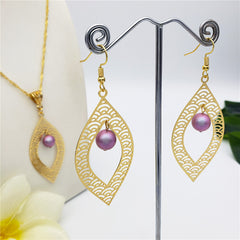 Set Of Carved Waves Double Leaves Earrings And Necklace Sustained With A Pearl In Different Colors