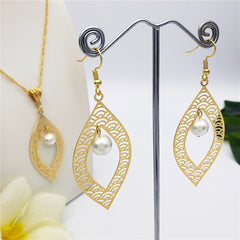 Set Of Carved Waves Double Leaves Earrings And Necklace Sustained With A Pearl In Different Colors